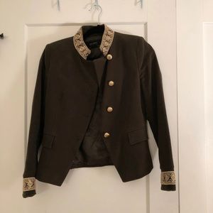 Green blazer with gold detail